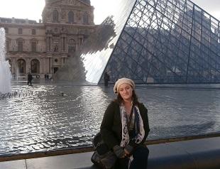 Student in front of the Pyramid at the Louvre