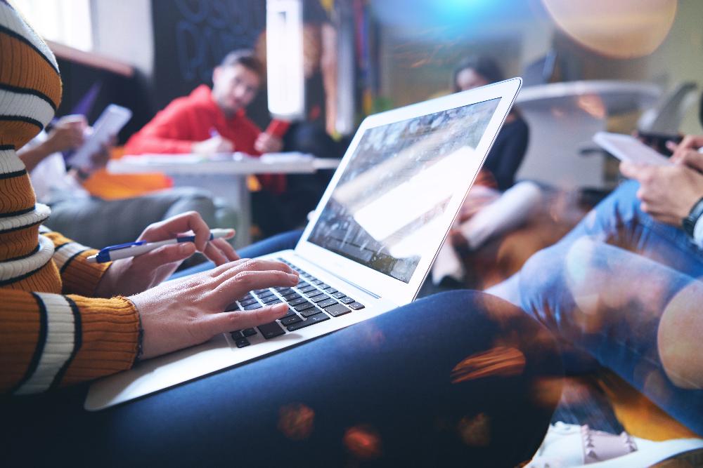 Student works on laptop